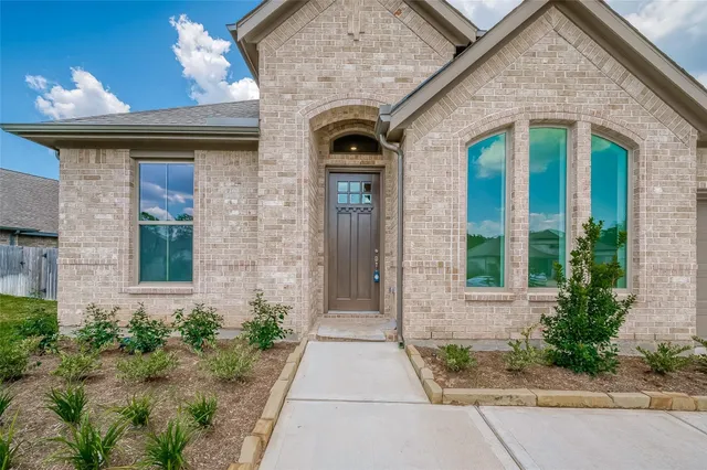 a front view of a house with a porch