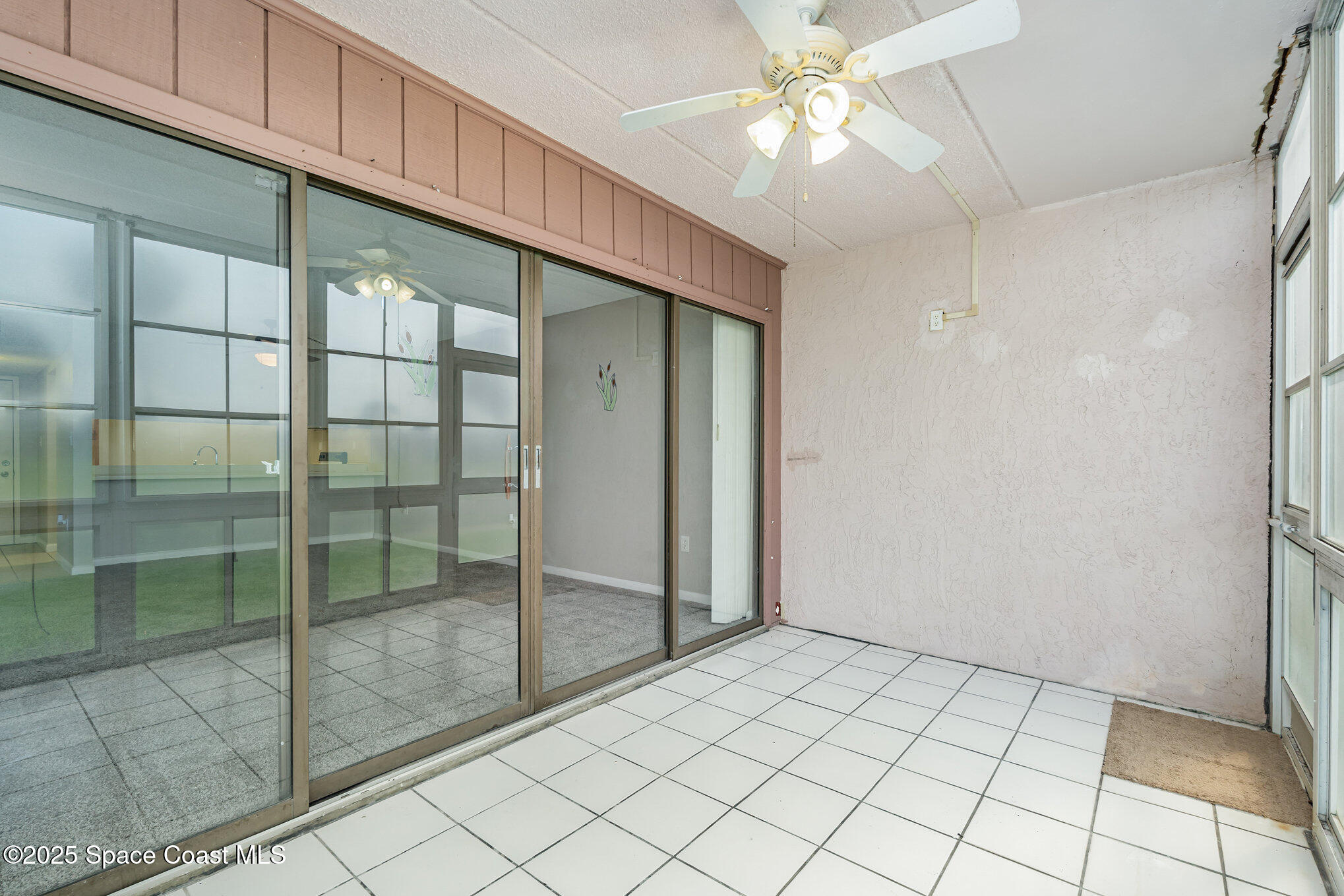2727 North Wickham Road, Unit 10210 Melbourne, FL 32935 - Photo 20 of 35 a view of an empty room