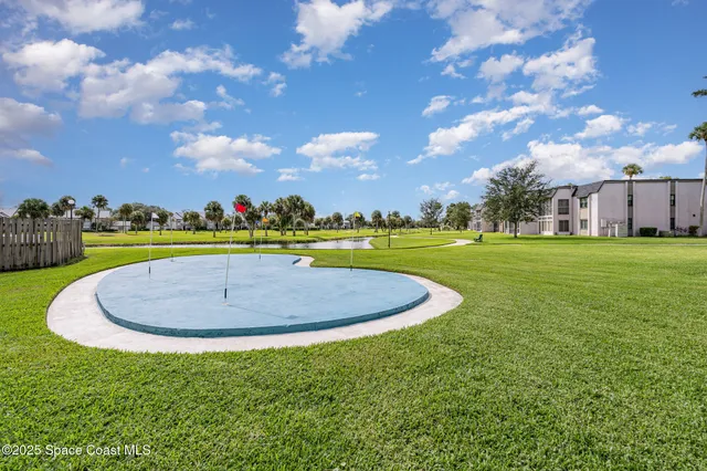 a view of a golf course with a garden