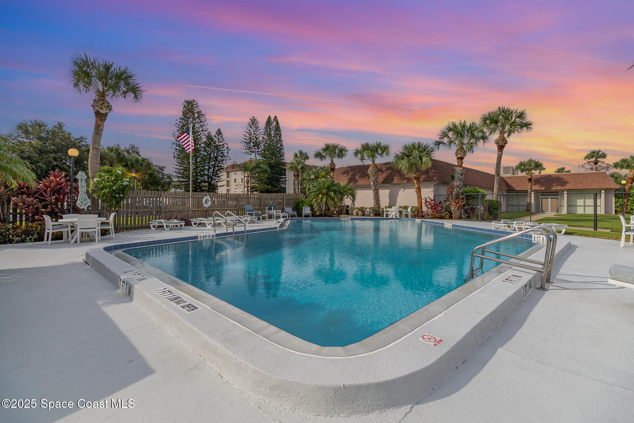 2727 North Wickham Road, Unit 10210 Melbourne, FL 32935 - Photo 31 of 35 a view of a swimming pool with a terrace