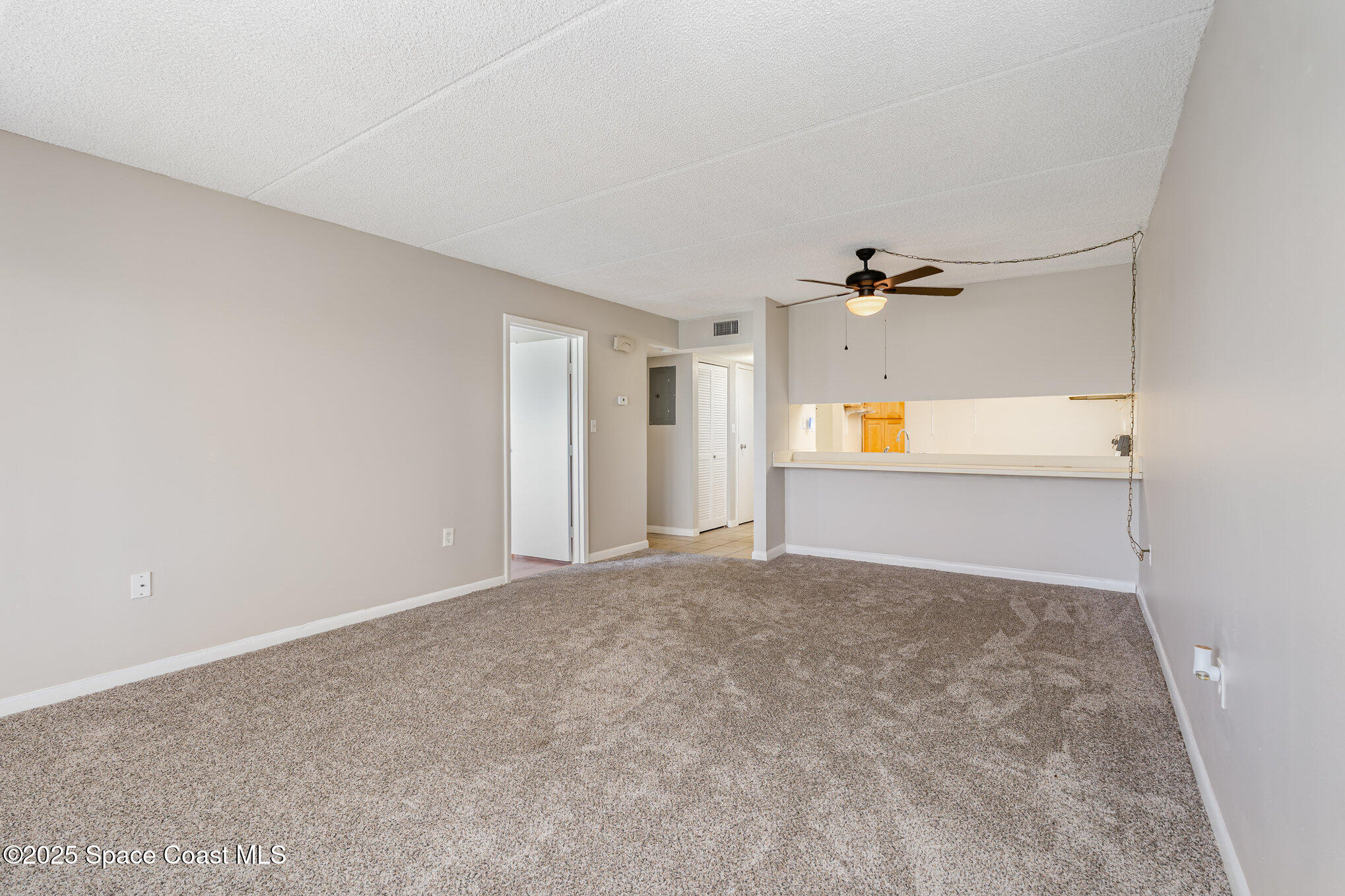 2727 North Wickham Road, Unit 10210 Melbourne, FL 32935 - Photo 8 of 35 a view of an empty room