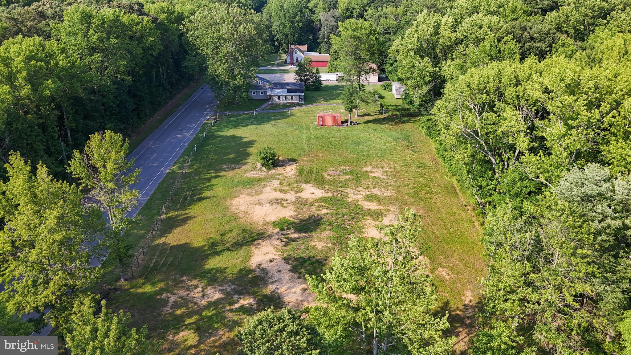 0 Fort Mott Road Pennsville, NJ 08070 - Photo 15 of 18 a backyard of a house with a yard and outdoor seating
