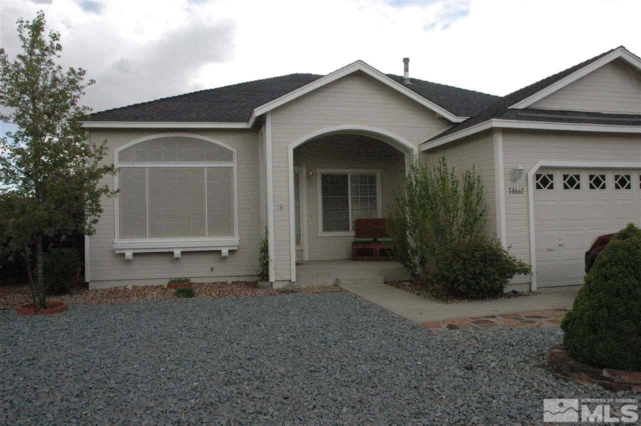 14661 Gold Run Drive Reno, NV 89521 - Photo 1 of 12 a front view of a house with garden