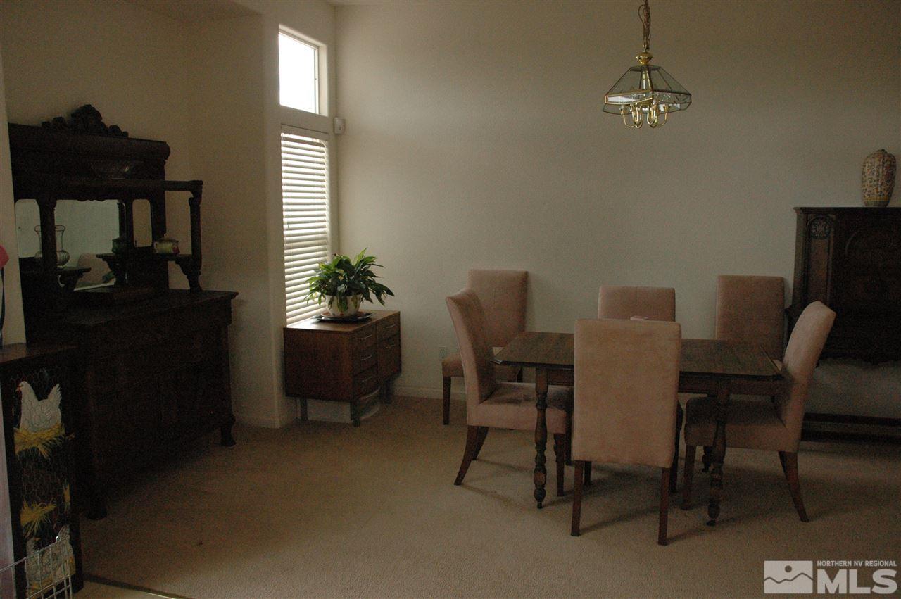 14661 Gold Run Drive Reno, NV 89521 - Photo 3 of 12 a dining room with furniture and window