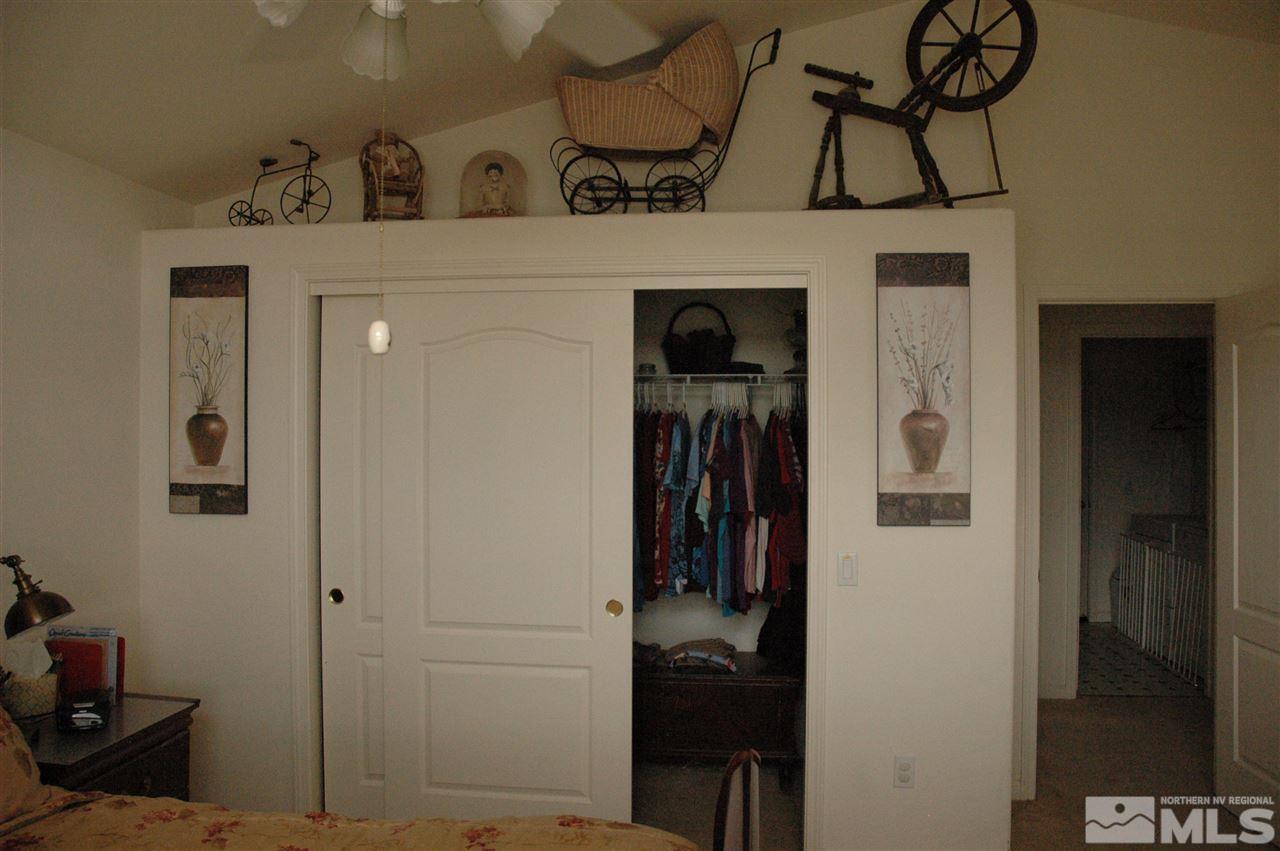 14661 Gold Run Drive Reno, NV 89521 - Photo 6 of 12 a view of a hallway with closet