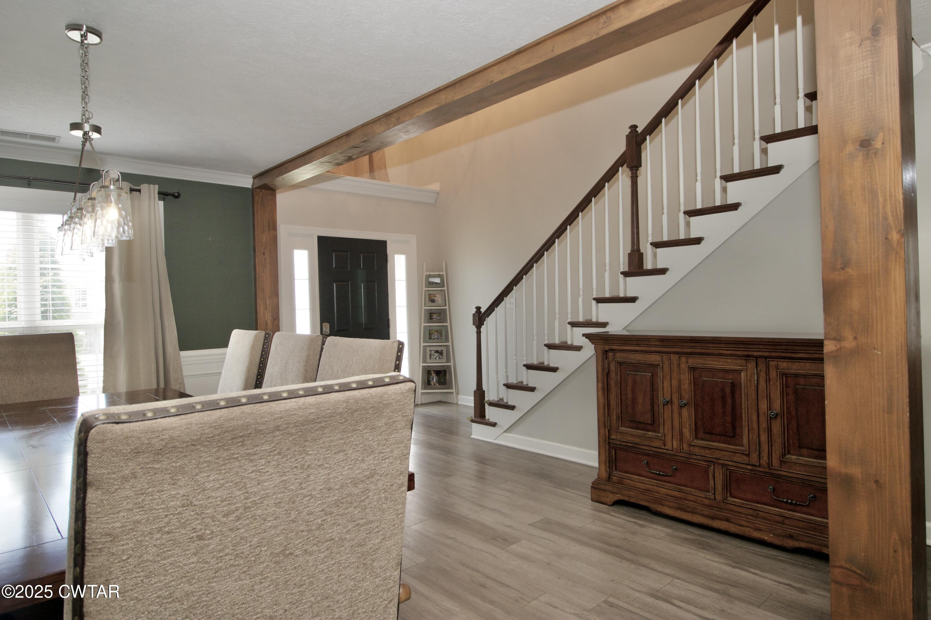 177 Fawn Ridge Lane Medina, TN 38355 - Photo 12 of 44 a living room with furniture and a chandelier