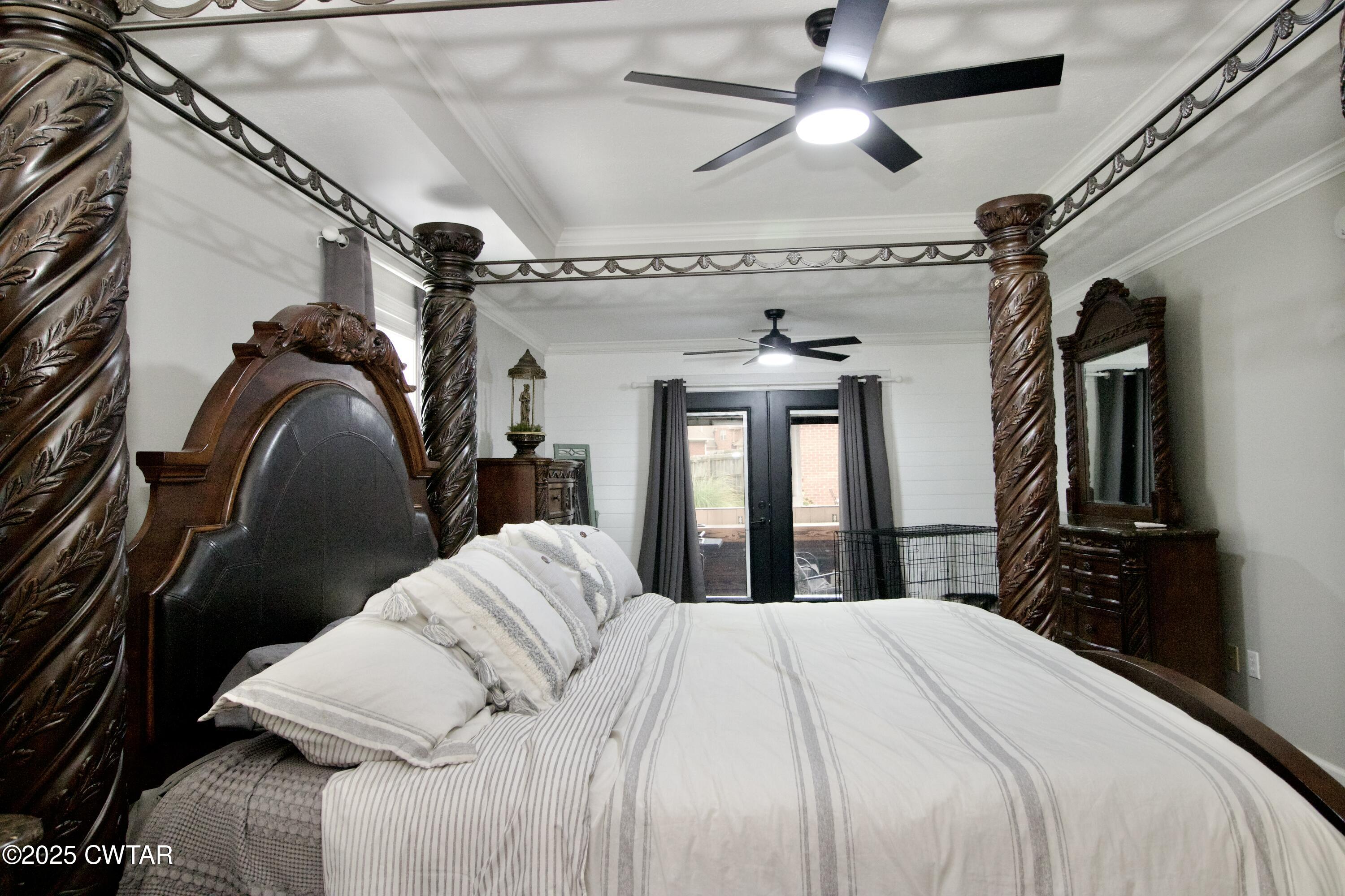 177 Fawn Ridge Lane Medina, TN 38355 - Photo 14 of 44 a bedroom with a bed with the view of balcony