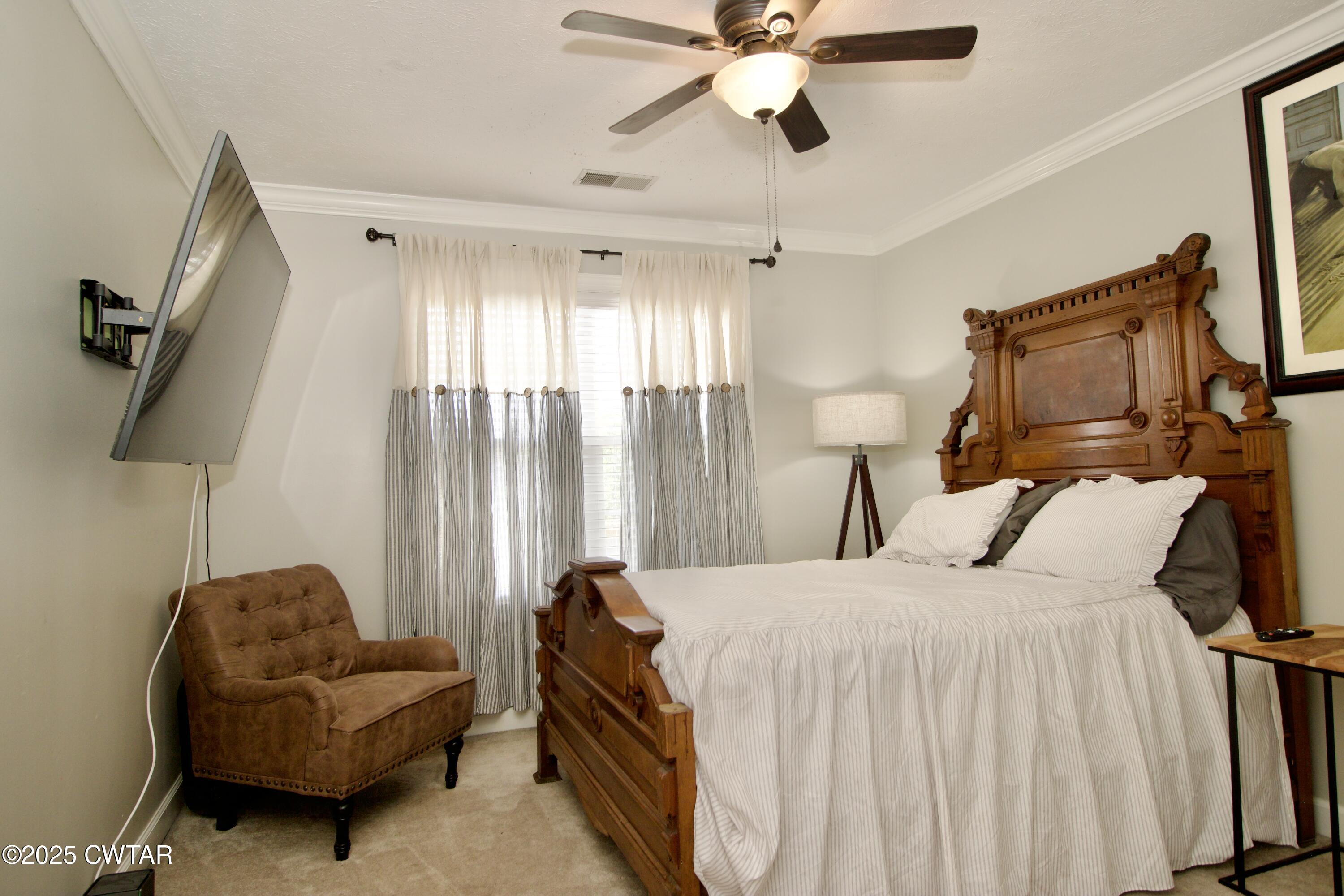 177 Fawn Ridge Lane Medina, TN 38355 - Photo 19 of 44 a bedroom with a bed and a couch