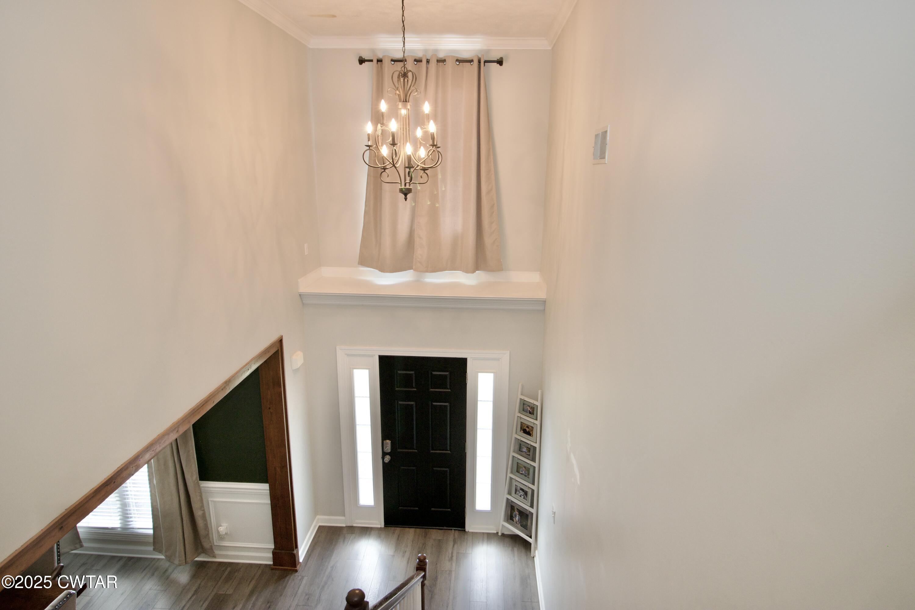 177 Fawn Ridge Lane Medina, TN 38355 - Photo 26 of 44 a view of a livingroom with wooden floor a fireplace and windows