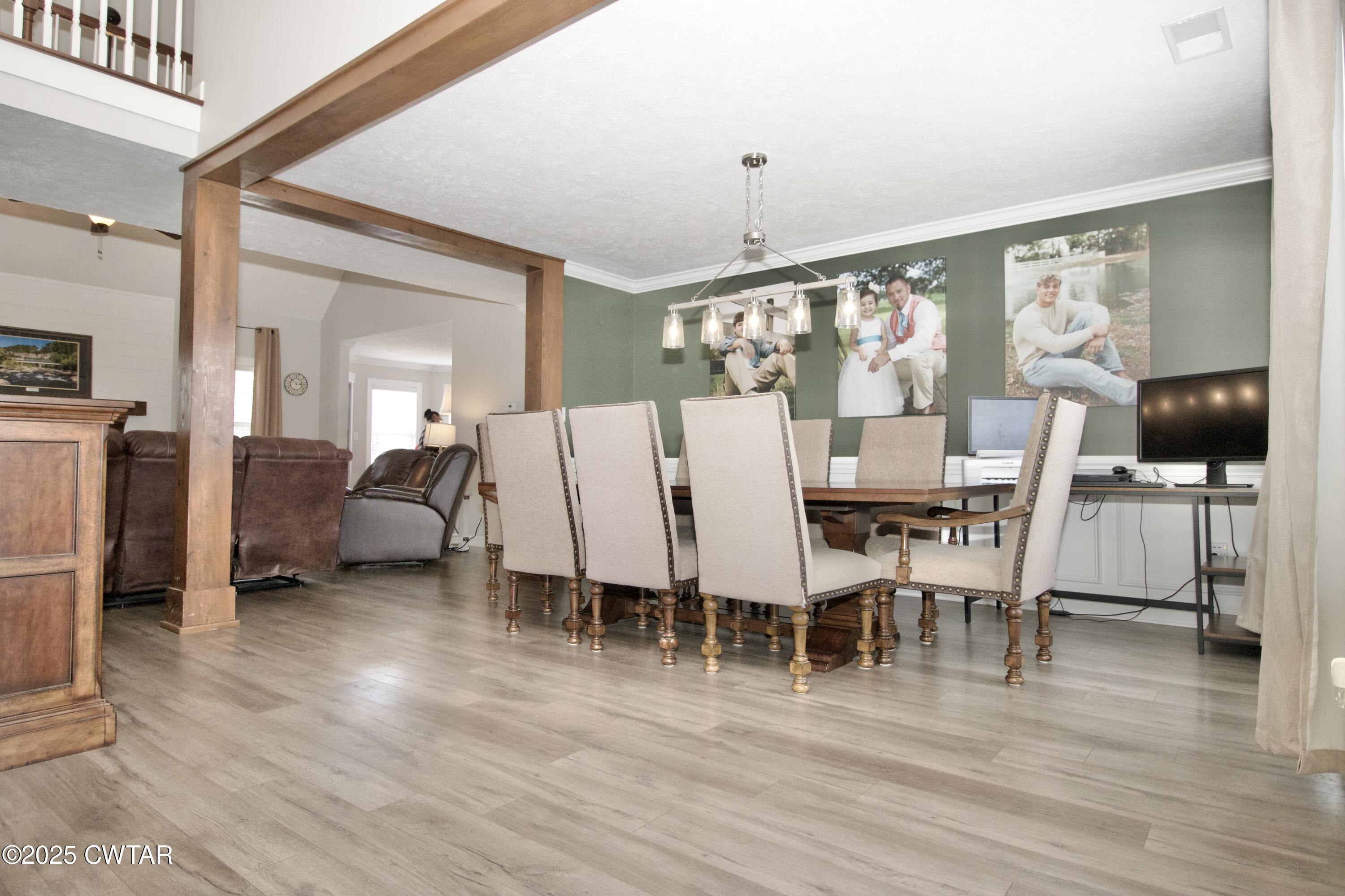 177 Fawn Ridge Lane Medina, TN 38355 - Photo 27 of 44 a view of a dining room with furniture window and wooden floor