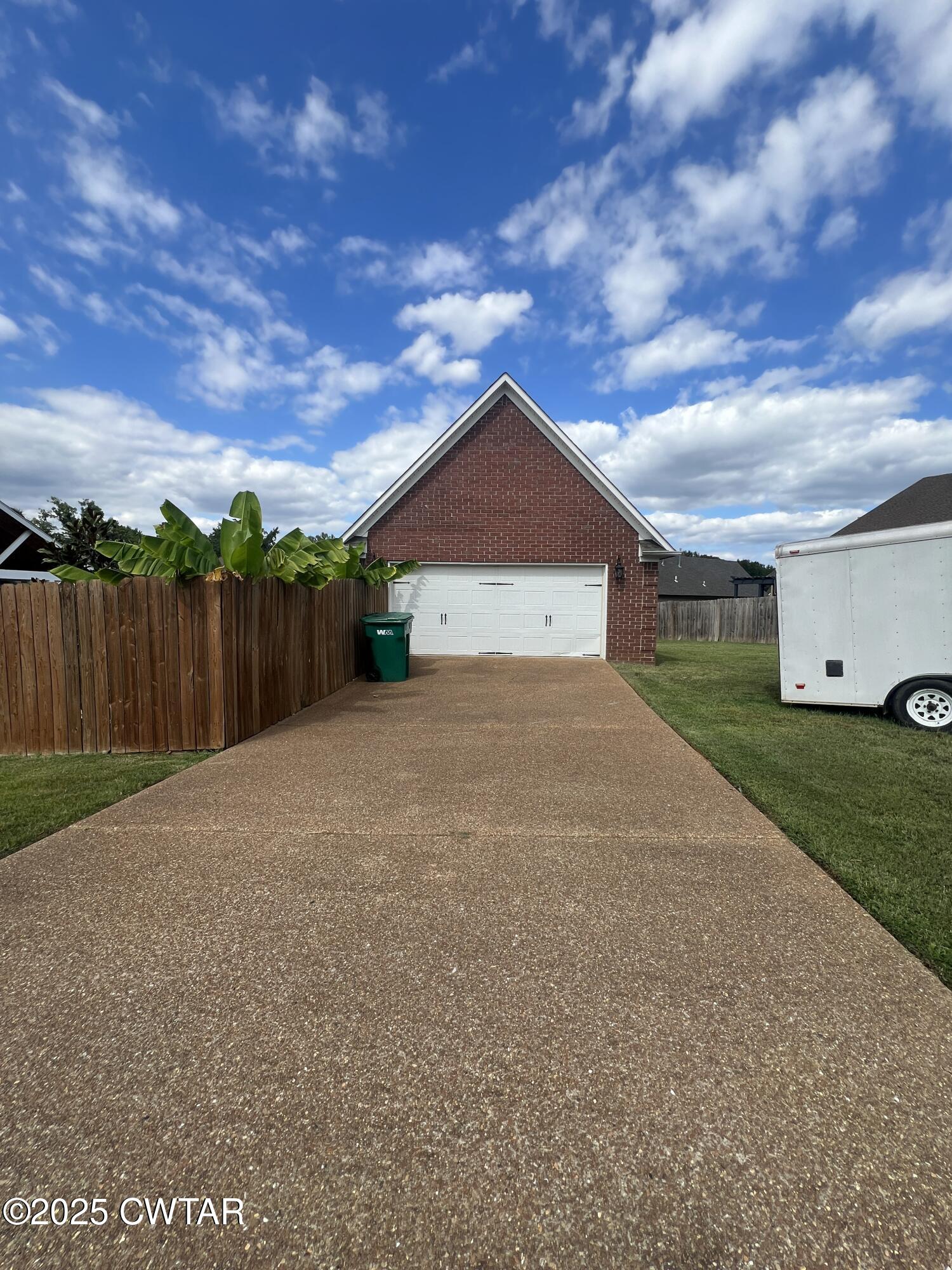 177 Fawn Ridge Lane Medina, TN 38355 - Photo 3 of 44 a view of a house with a yard