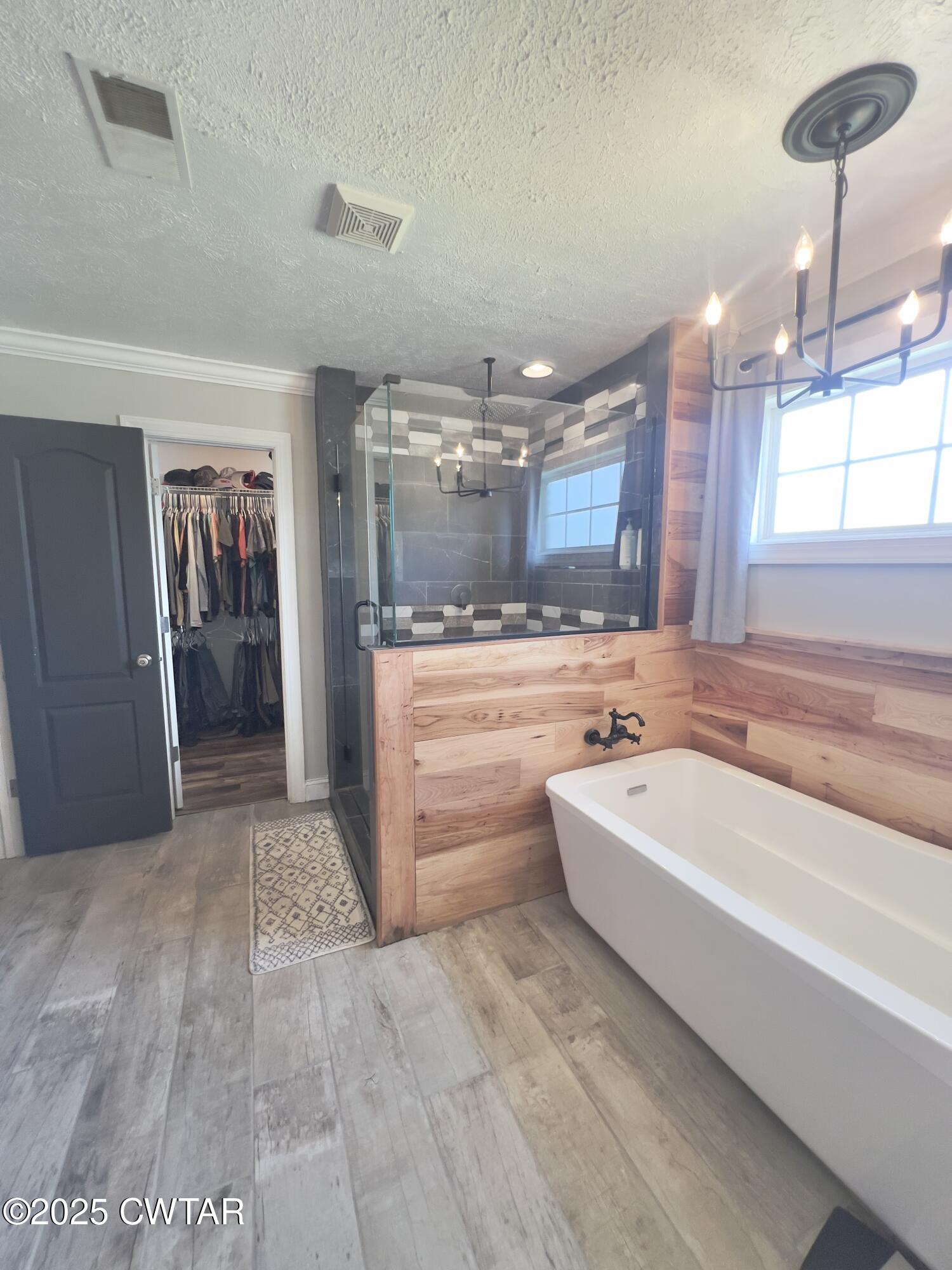 177 Fawn Ridge Lane Medina, TN 38355 - Photo 34 of 44 a bathroom with a tub a sink and a large mirror