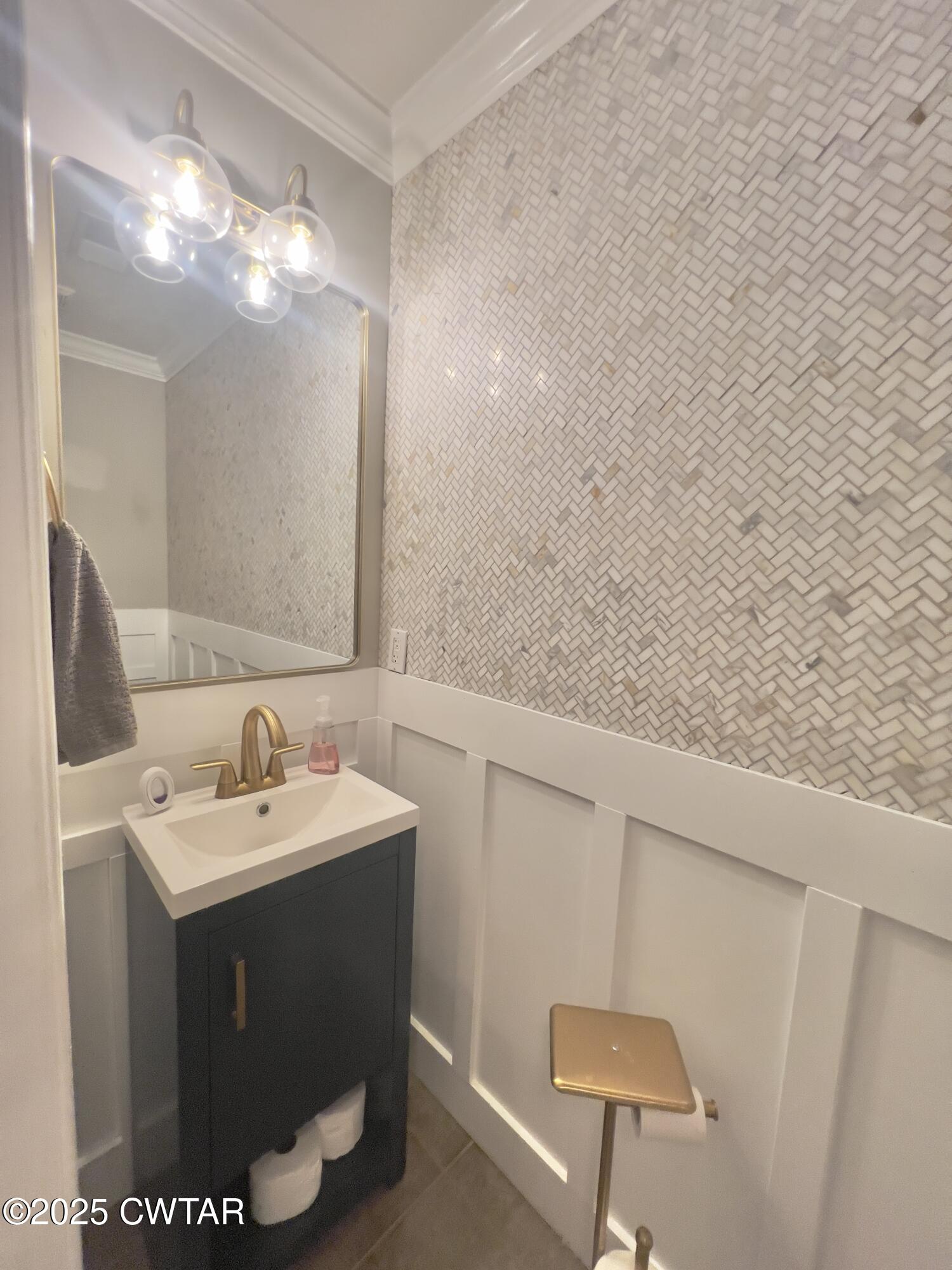 177 Fawn Ridge Lane Medina, TN 38355 - Photo 37 of 44 a bathroom with a sink a toilet and mirror