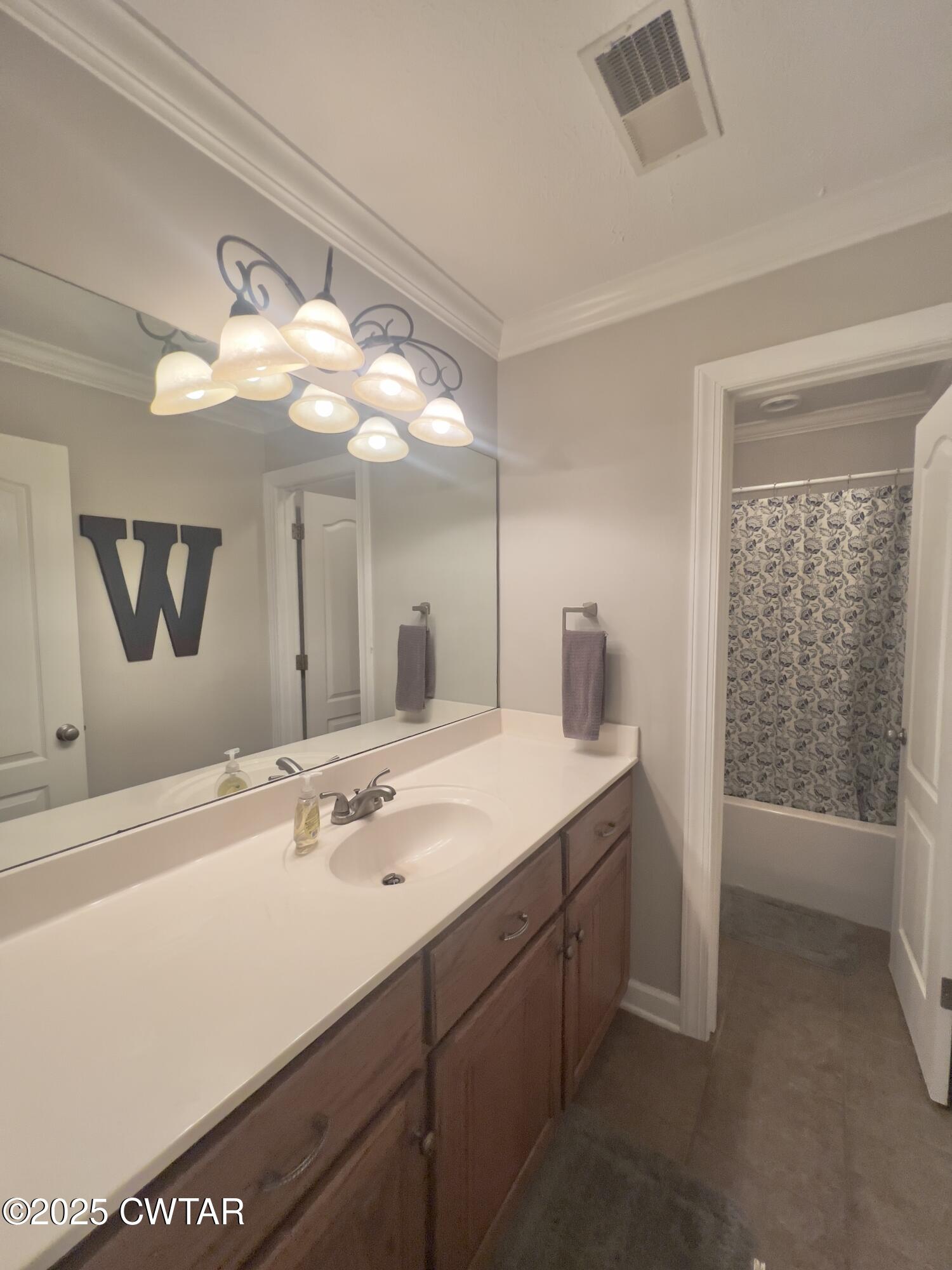 177 Fawn Ridge Lane Medina, TN 38355 - Photo 39 of 44 a bathroom with a sink vanity and a mirror