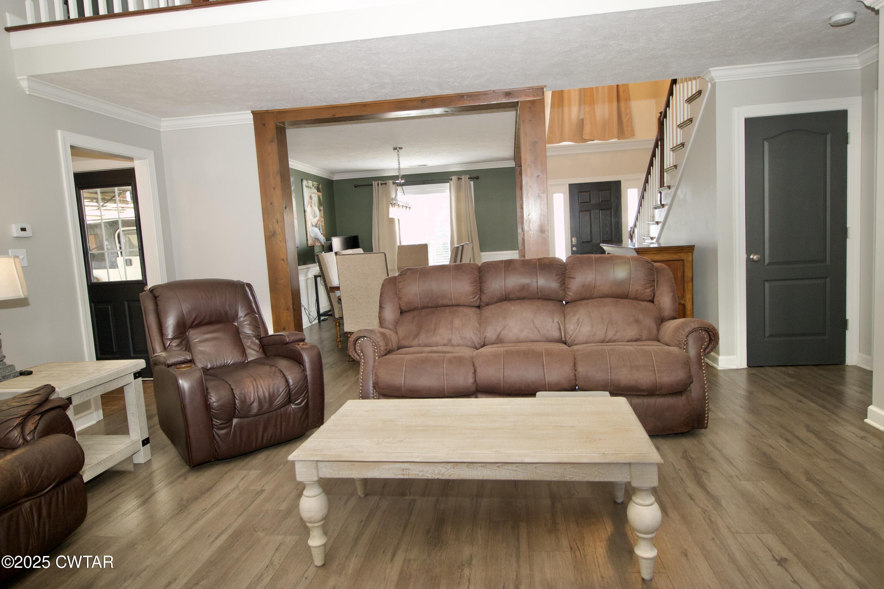 177 Fawn Ridge Lane Medina, TN 38355 - Photo 10 of 44 a living room with furniture and a wooden floor