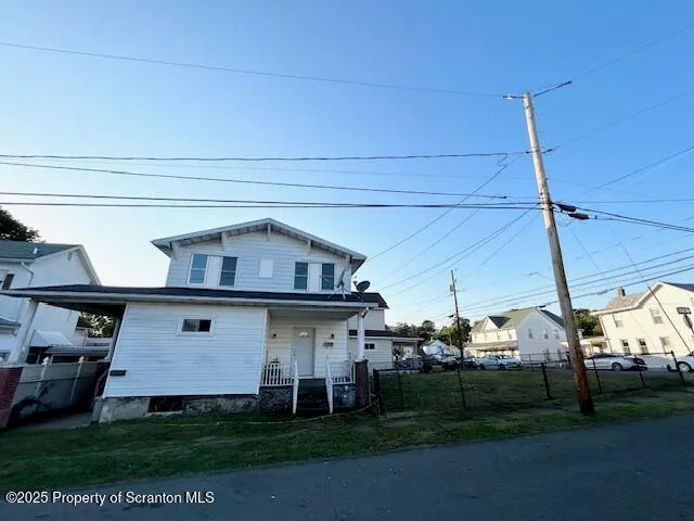 a view of a back yard of the house
