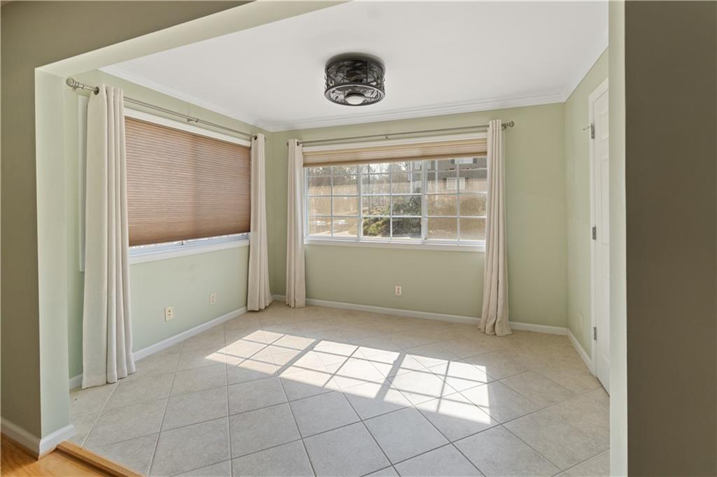 1468 Briarwood Road Northeast, Unit 1104 Atlanta, GA 30319 - Photo 3 of 15 a view of an empty room with a window