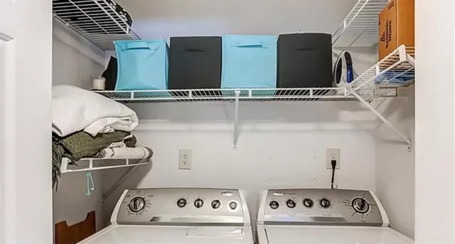 image of a utility room with dryer and washer