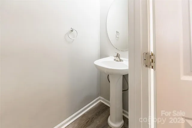 a bathroom with a sink and mirror