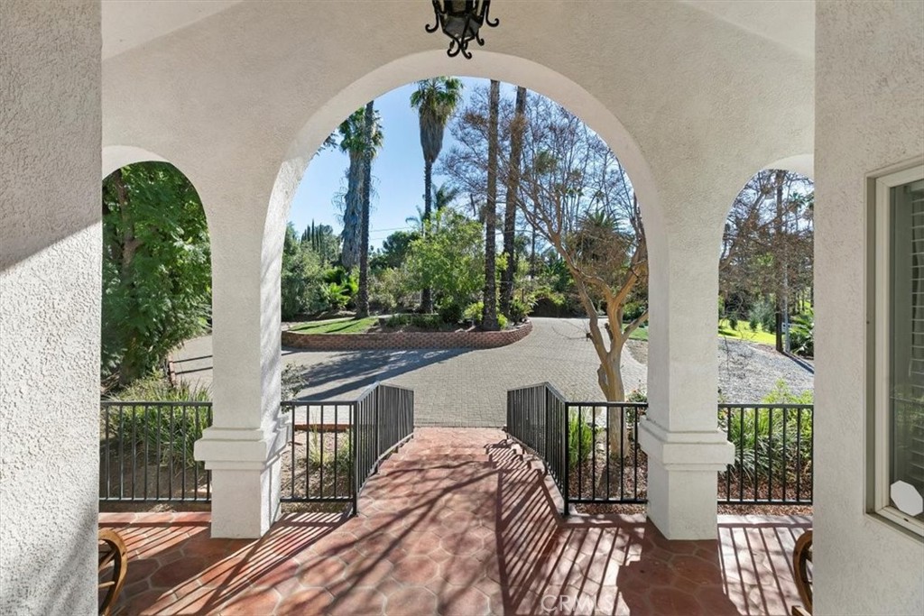 1619 Gratton Street Riverside, CA 92504 - Photo 12 of 62 a balcony view with couple of chairs and potted plants