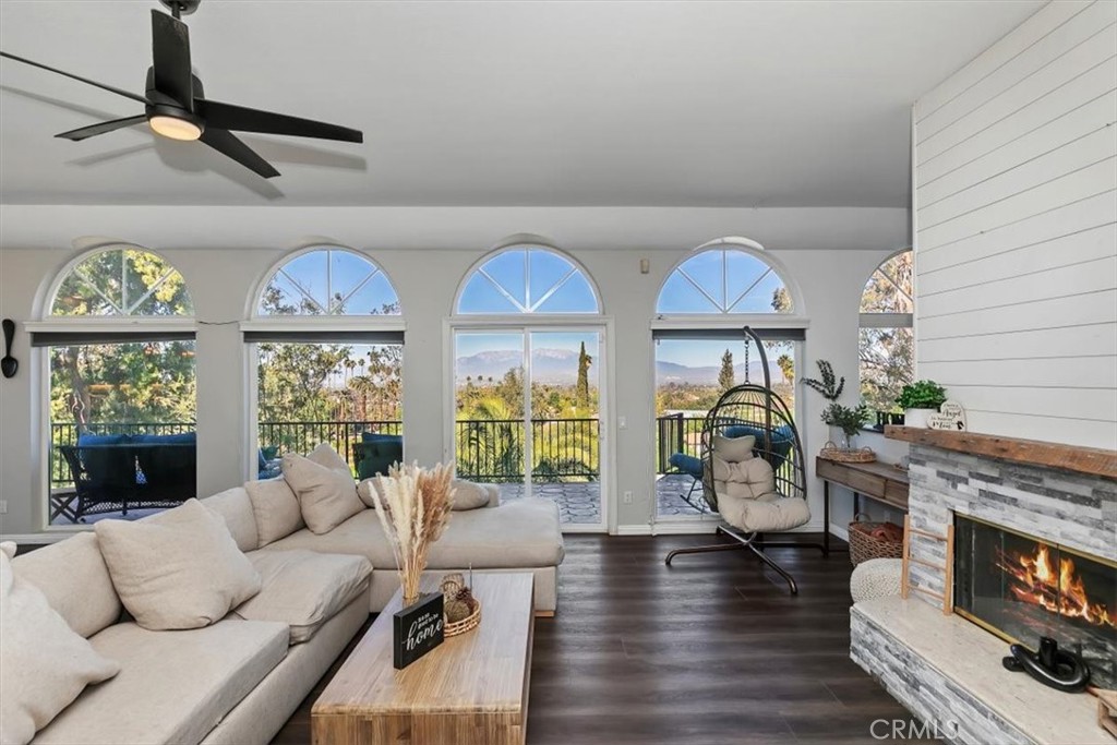 1619 Gratton Street Riverside, CA 92504 - Photo 16 of 62 a living room with furniture fireplace and flat screen tv