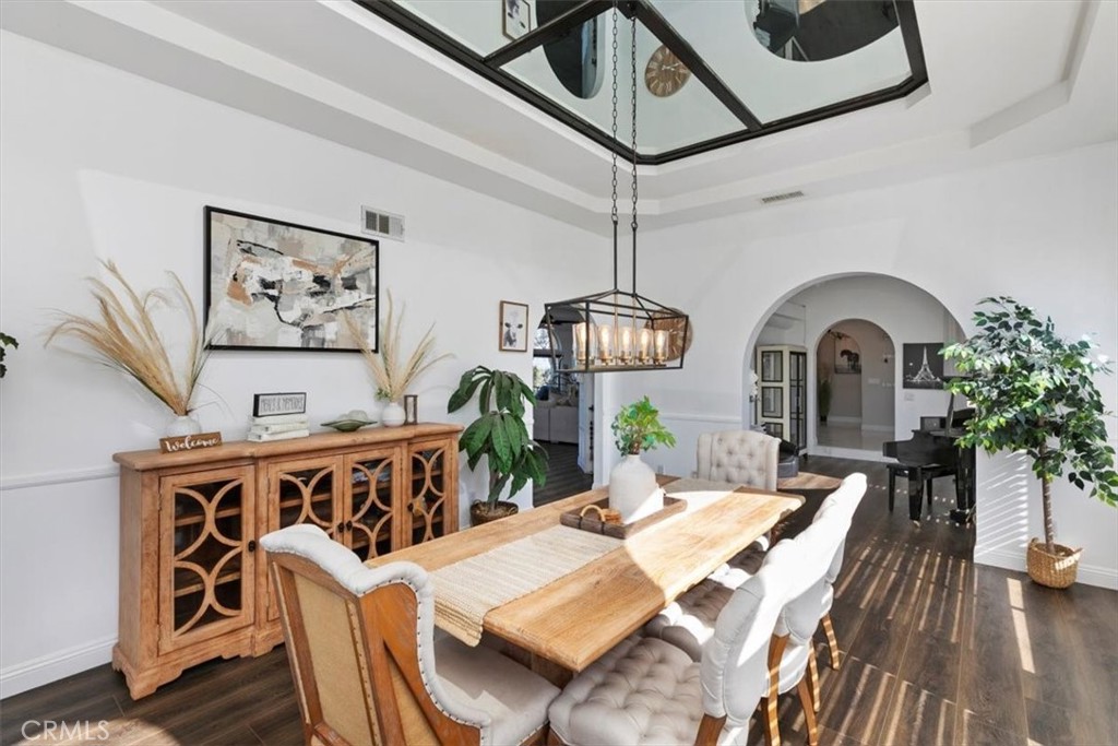 1619 Gratton Street Riverside, CA 92504 - Photo 25 of 62 a view of a dining room with furniture window and wooden floor