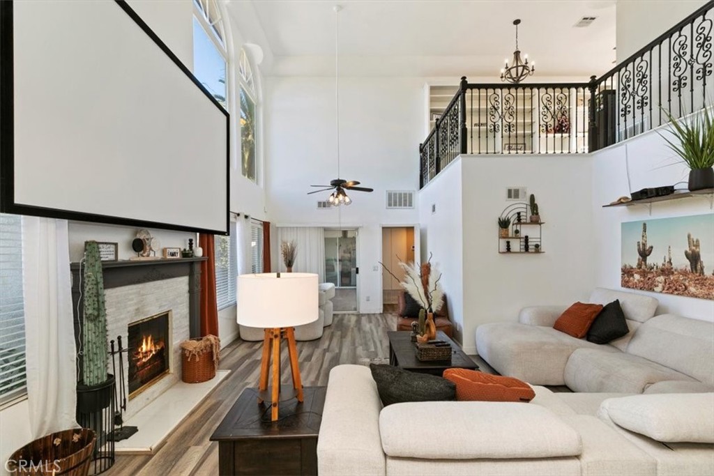 1619 Gratton Street Riverside, CA 92504 - Photo 28 of 62 a living room with furniture and a fireplace