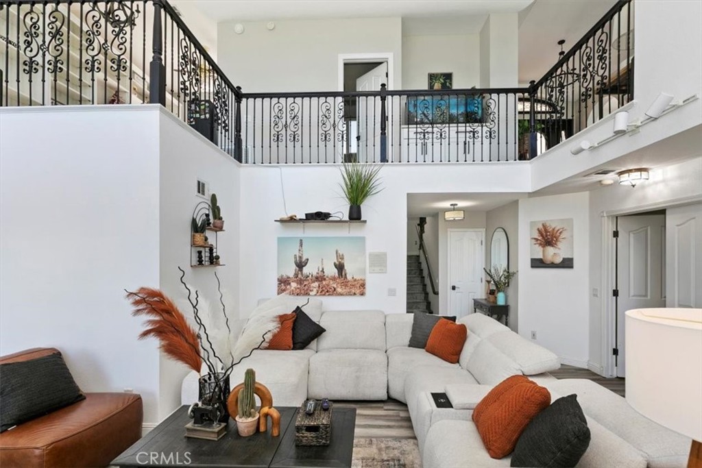 1619 Gratton Street Riverside, CA 92504 - Photo 31 of 62 a living room with furniture and a floor to ceiling window