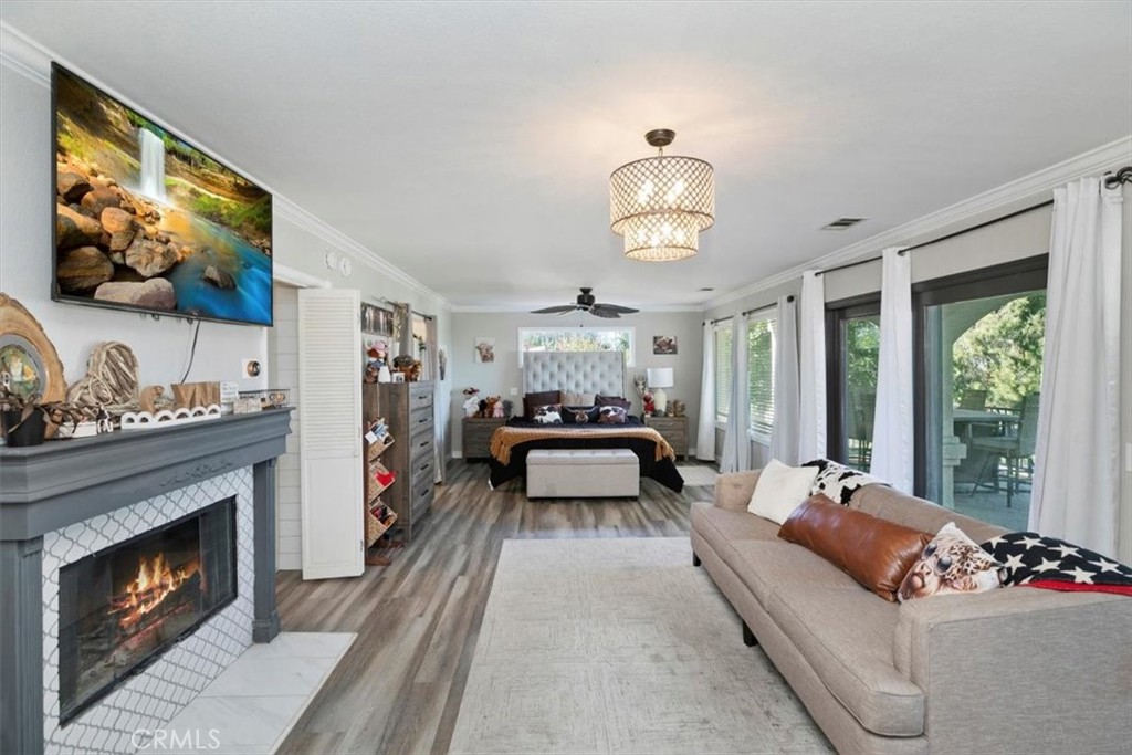 1619 Gratton Street Riverside, CA 92504 - Photo 39 of 62 a living room with furniture fireplace and flat screen tv