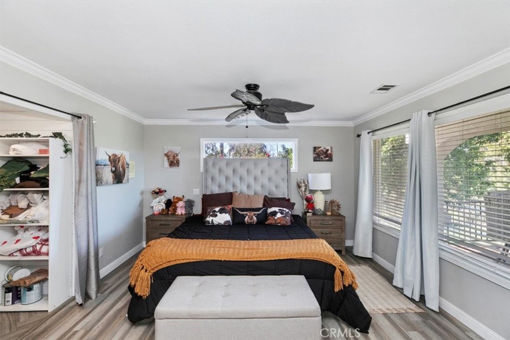 1619 Gratton Street Riverside, CA 92504 - Photo 40 of 62 a bed room with a bed and a window