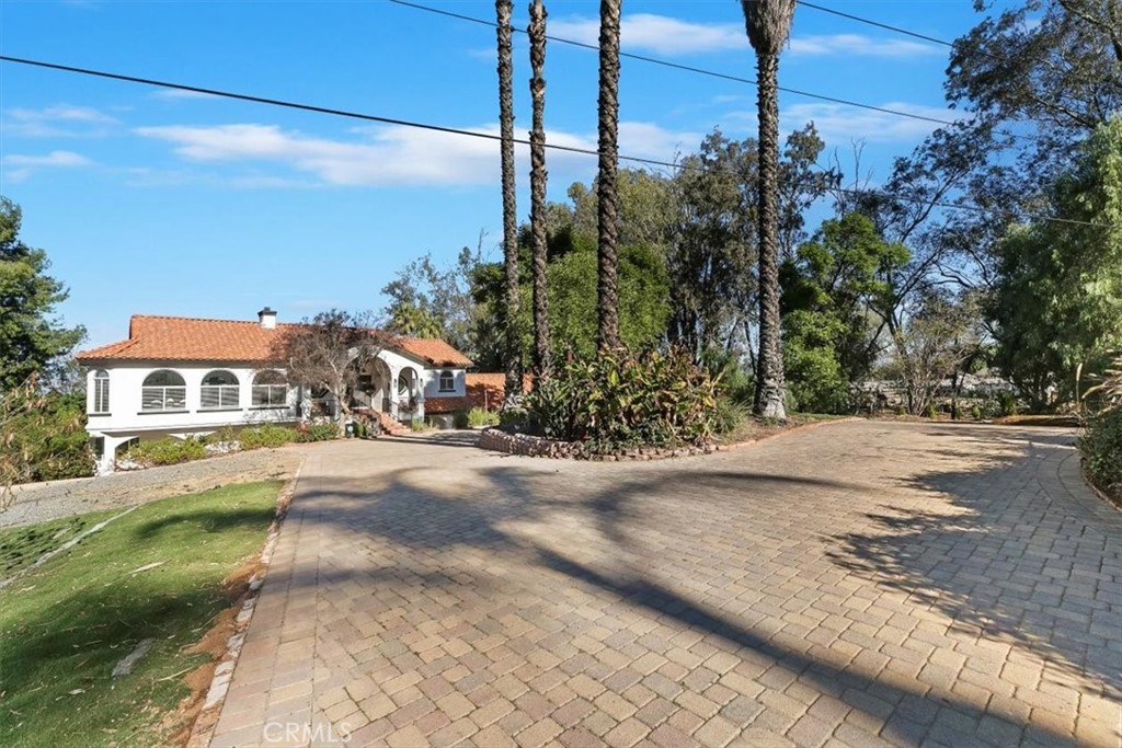 1619 Gratton Street Riverside, CA 92504 - Photo 5 of 62 a front view of a house with a yard