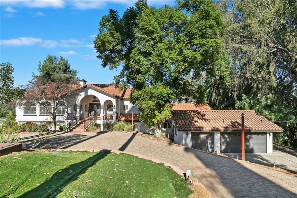 1619 Gratton Street Riverside, CA 92504 - Photo 7 of 62 a aerial view of a house with a yard table and chairs