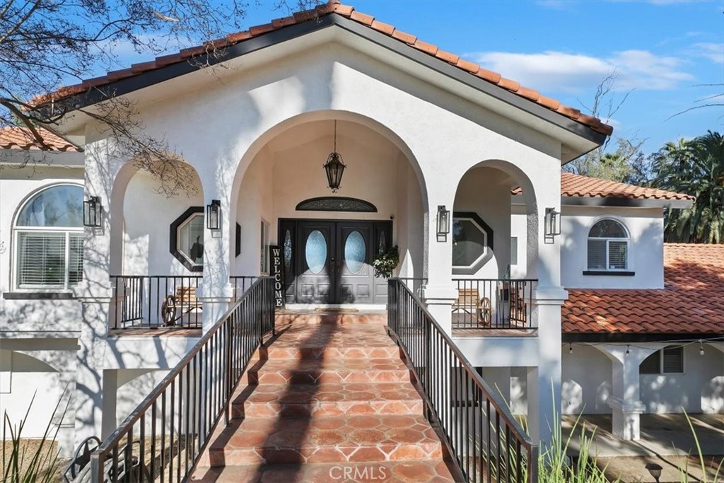 1619 Gratton Street Riverside, CA 92504 - Photo 10 of 62 a front view of a house with wooden stairs
