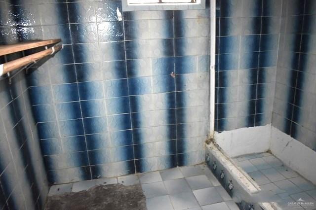 1851 3 Mile Line Road Penitas, TX 78576 - Photo 9 of 21 a bathroom with a sink and a shower