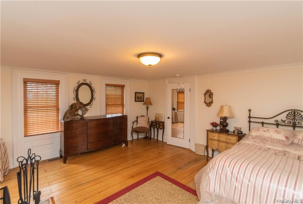 669 Mountain Road Bloomingburg, NY 12721 - Photo 22 of 36 Bedroom featuring light wood finished floors