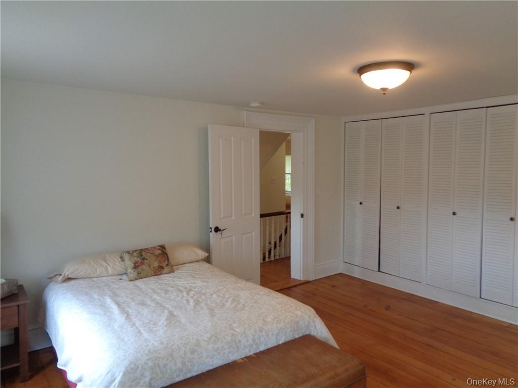669 Mountain Road Bloomingburg, NY 12721 - Photo 33 of 36 Bedroom featuring hardwood / wood-style floors