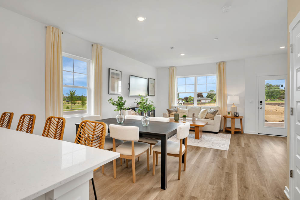 2257 Riesling Road Oswego, IL 60543 - Photo 9 of 23 a view of a dining room with furniture window and wooden floor