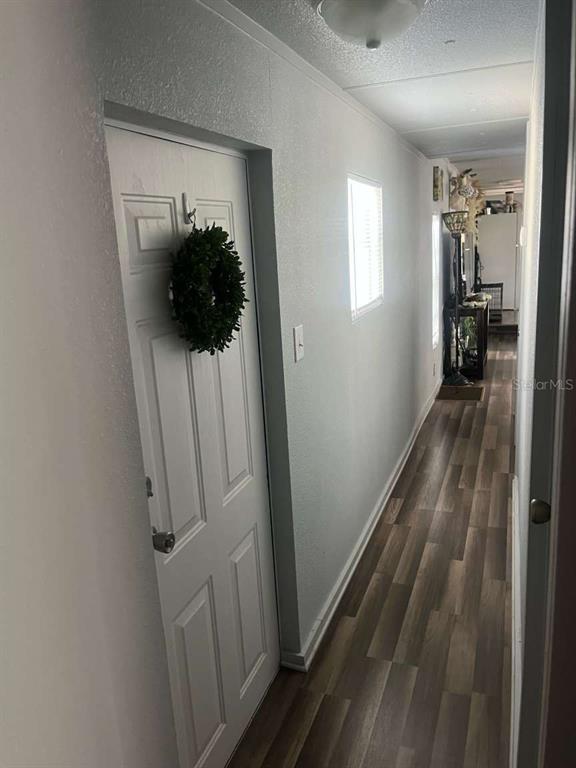 1511 Gaines Road Winter Haven, FL 33880 - Photo 5 of 20 a view of hallway with walk in closet