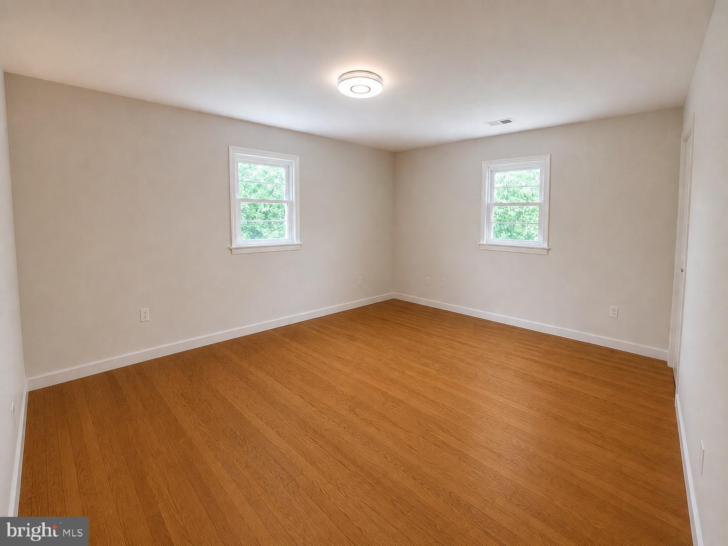 12658 Scaggsville Road Highland, MD 20777 - Photo 2 of 13 an empty room with a window