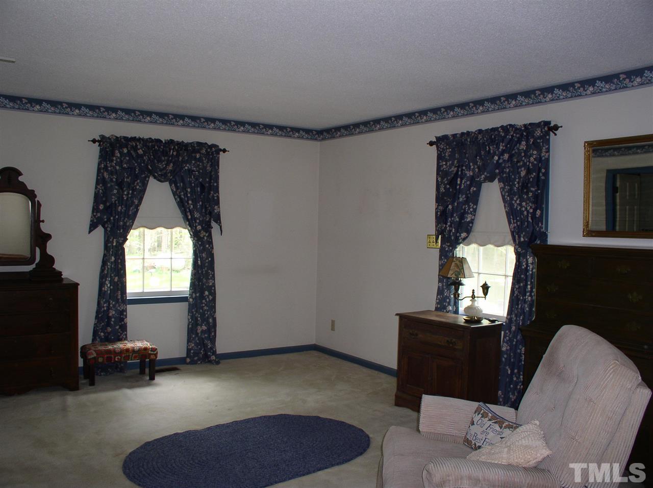 96 Pine View Road Henderson, NC 27537 - Photo 10 of 25 Master bedroom with private bathroom