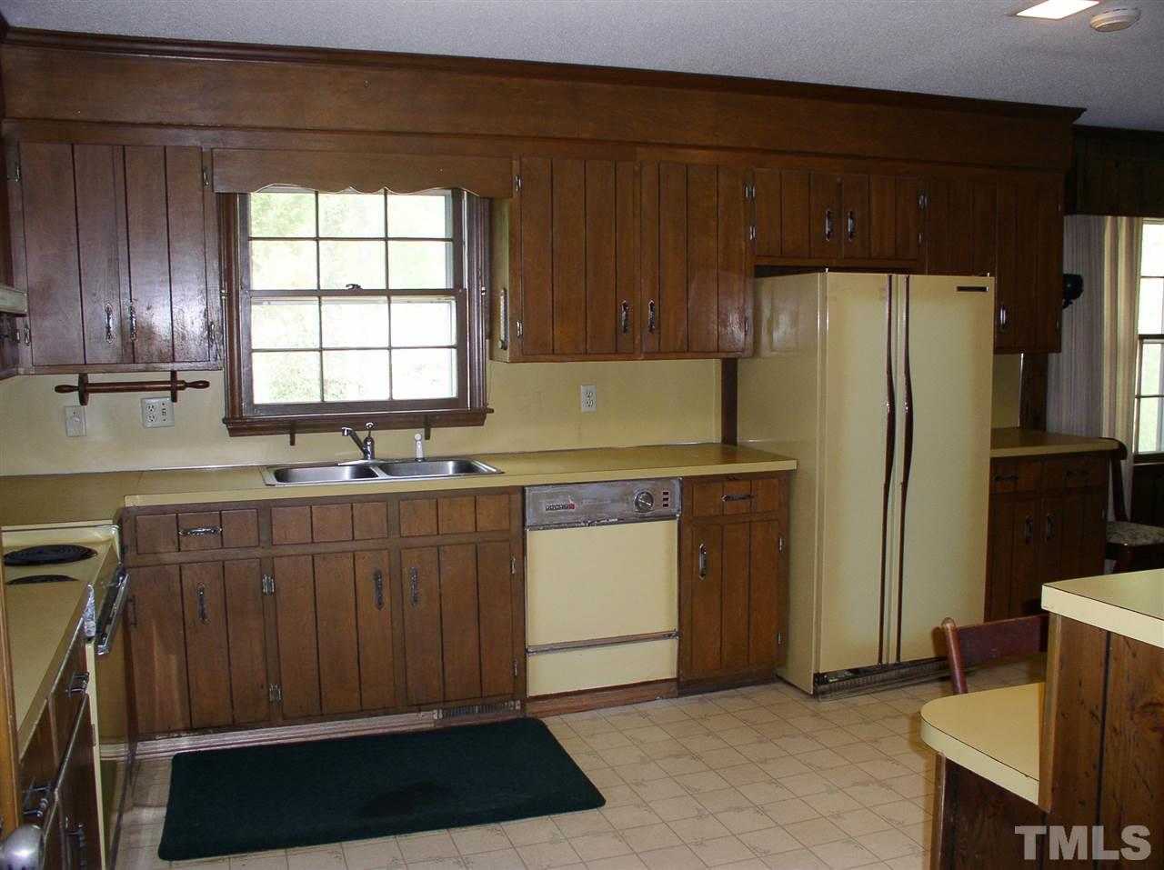 96 Pine View Road Henderson, NC 27537 - Photo 6 of 25 Kitchen with ample cabinets and counter space.