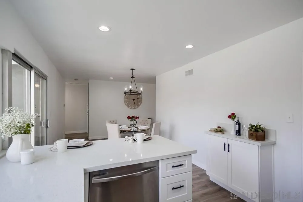 10021 Allenwood Way Santee, CA 92071 - Photo 13 of 30 a kitchen with a sink cabinets and wooden floor