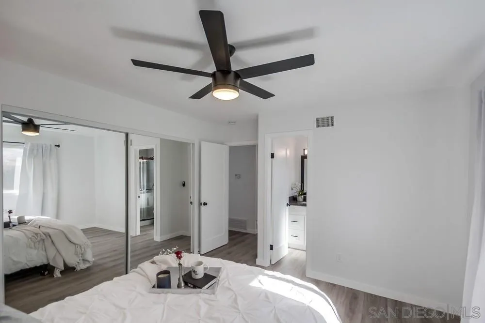 10021 Allenwood Way Santee, CA 92071 - Photo 21 of 30 a bedroom with a bed and a couch