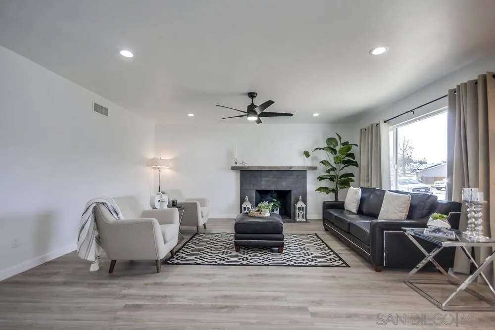 10021 Allenwood Way Santee, CA 92071 - Photo 5 of 30 a living room with furniture and a fireplace