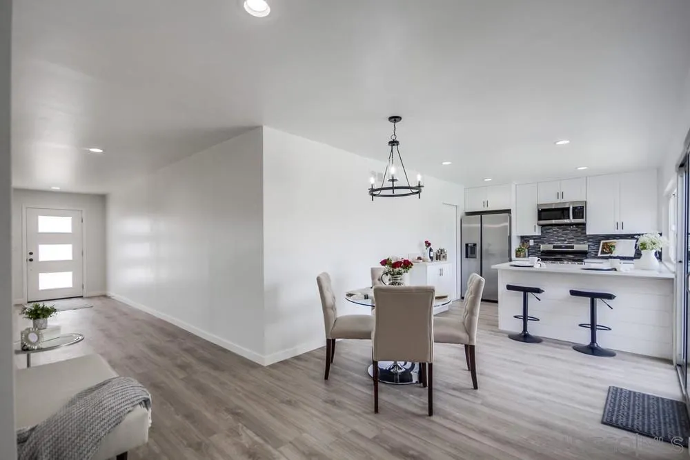 10021 Allenwood Way Santee, CA 92071 - Photo 6 of 30 a view of a dining room with furniture and wooden floor