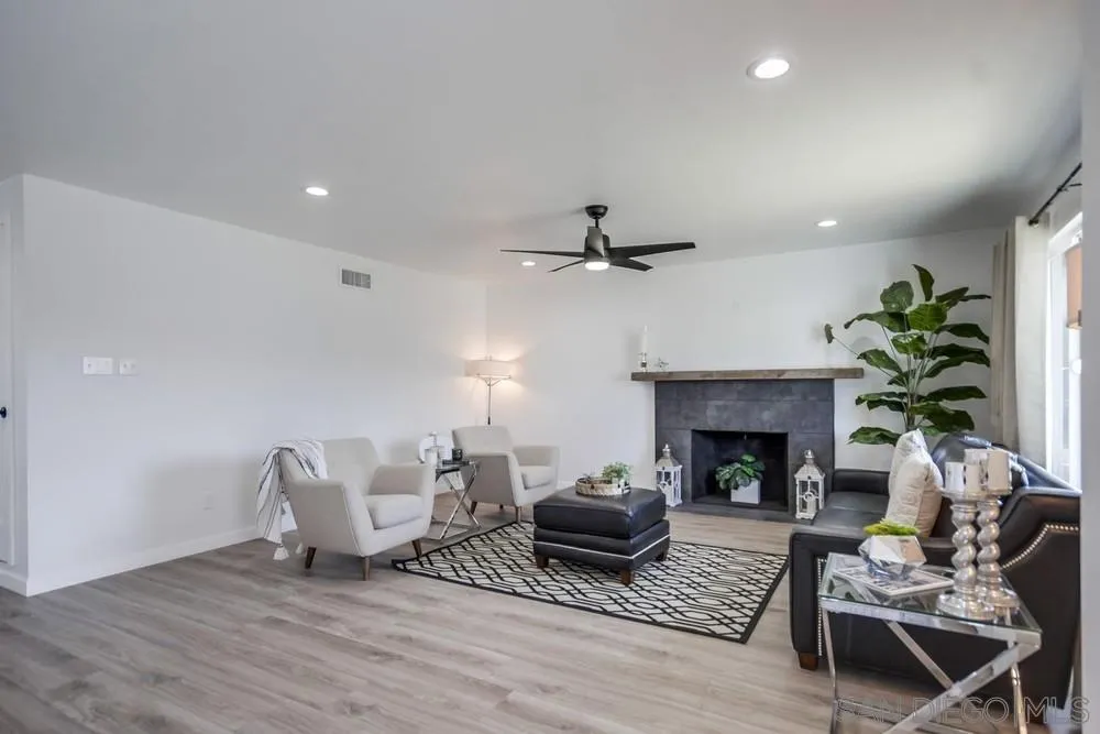 10021 Allenwood Way Santee, CA 92071 - Photo 7 of 30 a living room with furniture and a fireplace