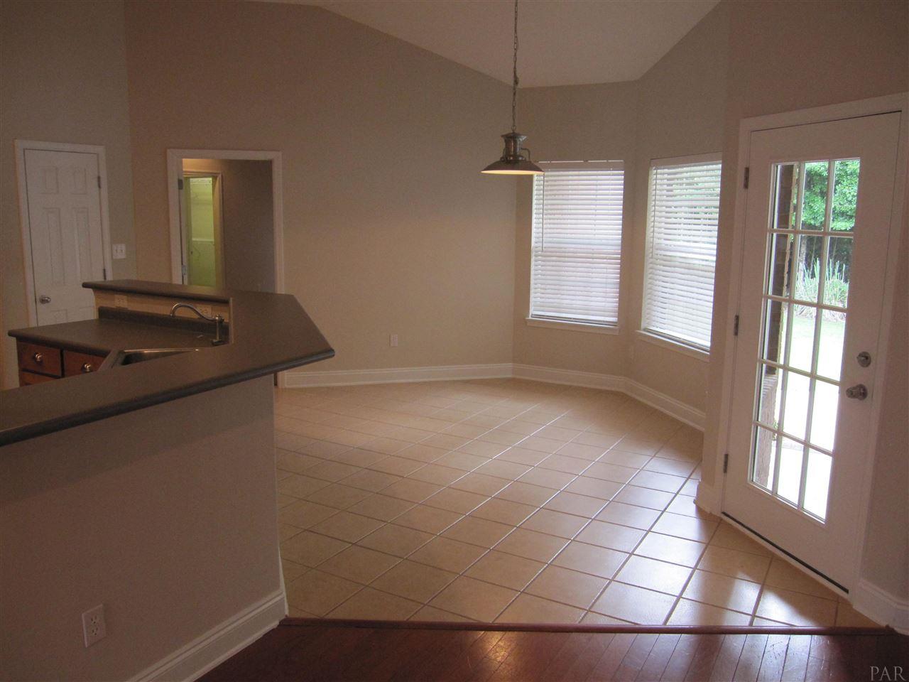 3575 Haley Way Pace, FL 32571 - Photo 18 of 50 with bay windows & tile flooring.