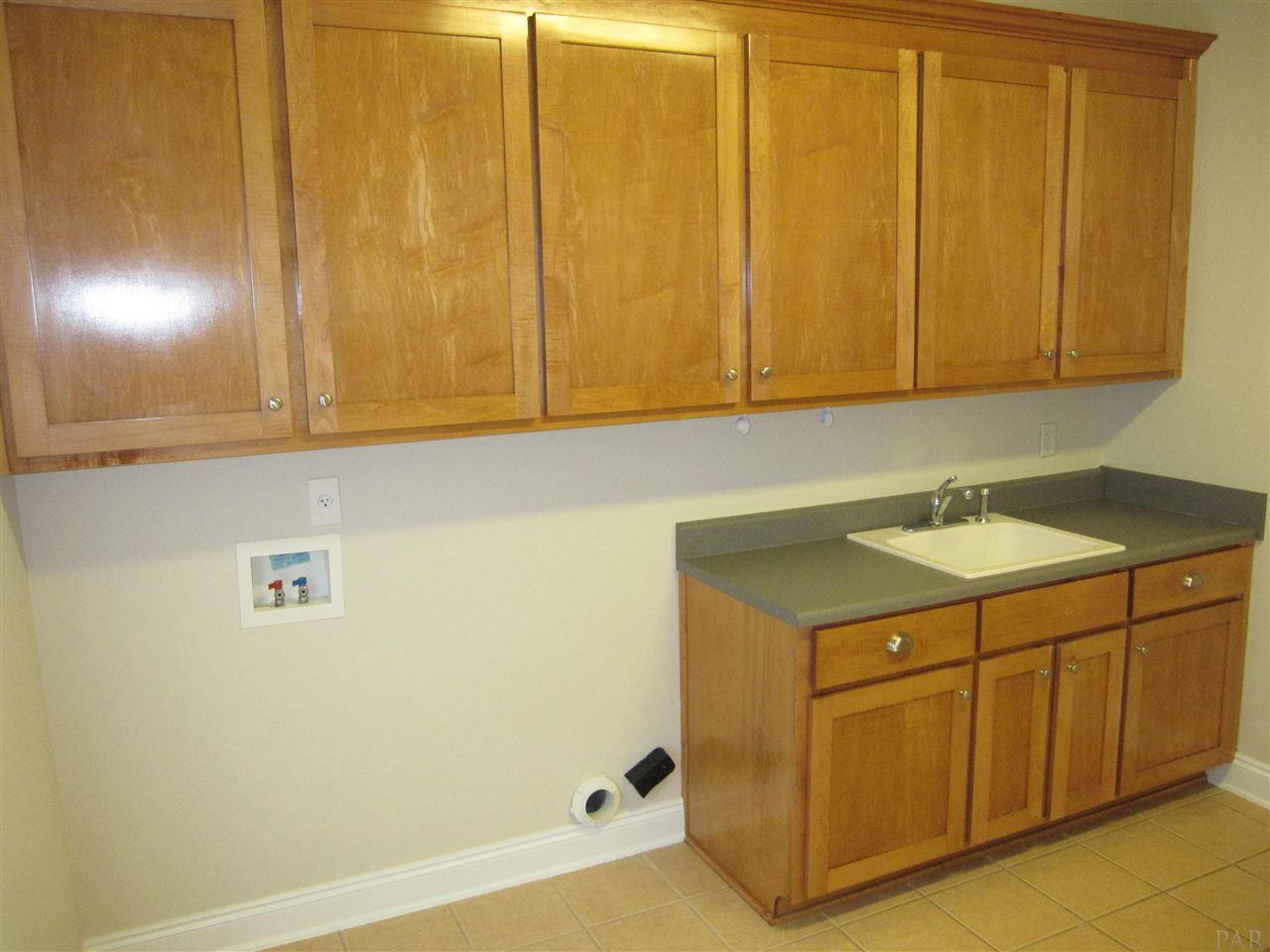 3575 Haley Way Pace, FL 32571 - Photo 34 of 50 Maple cabinets & tile flooring.