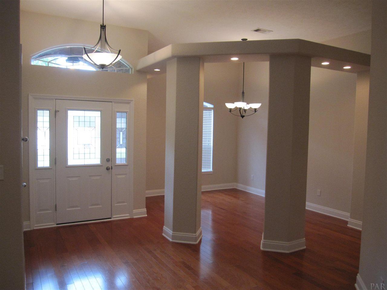 3575 Haley Way Pace, FL 32571 - Photo 5 of 50 Wood floors continue into the great room & hallway
