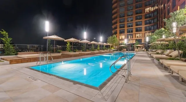 a view of a swimming pool with a patio